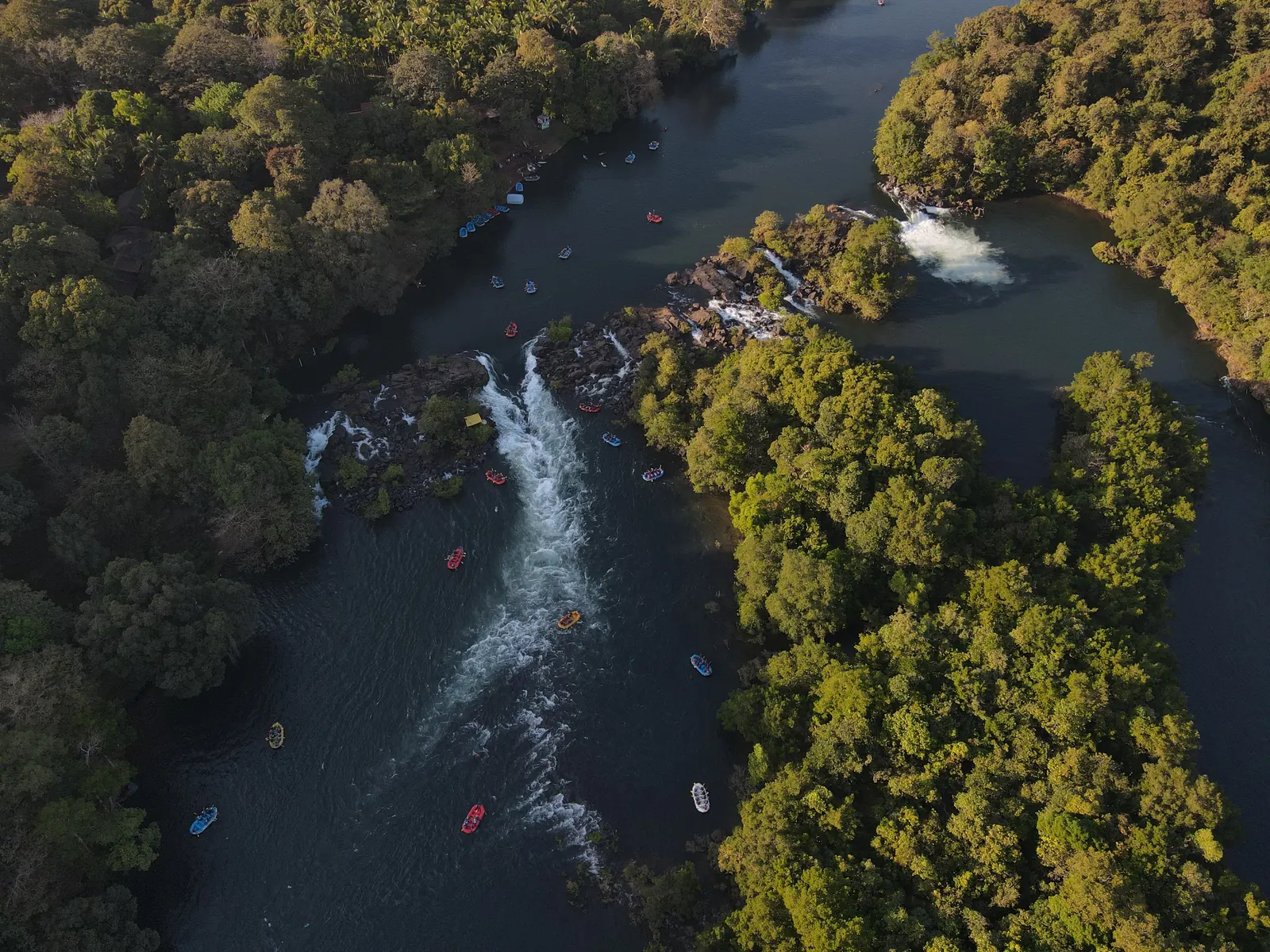 Aerial view of the Kali River flowing between forested islands near Dandeli